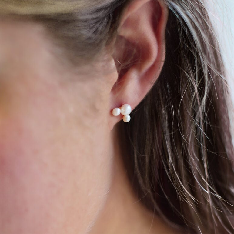 3-5mm Freshwater button pearls set on yellow gold-plated Sterling Silver stud earrings