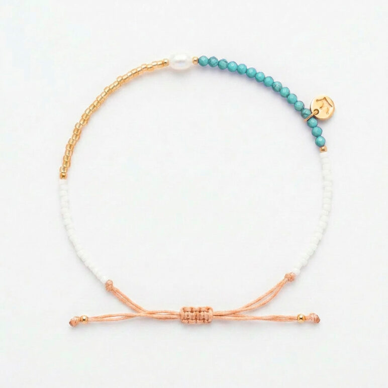white 4mm oval freshwater pearl Turquoise stone drawstring bracelet with white and yellow gold coloured beads