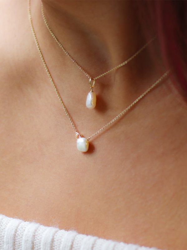 8mm white Keshi freshwater pearl 9ct yellow gold pendant paired with 8mm white Keshi freshwater pearl white topaz 9ct yellow gold necklace