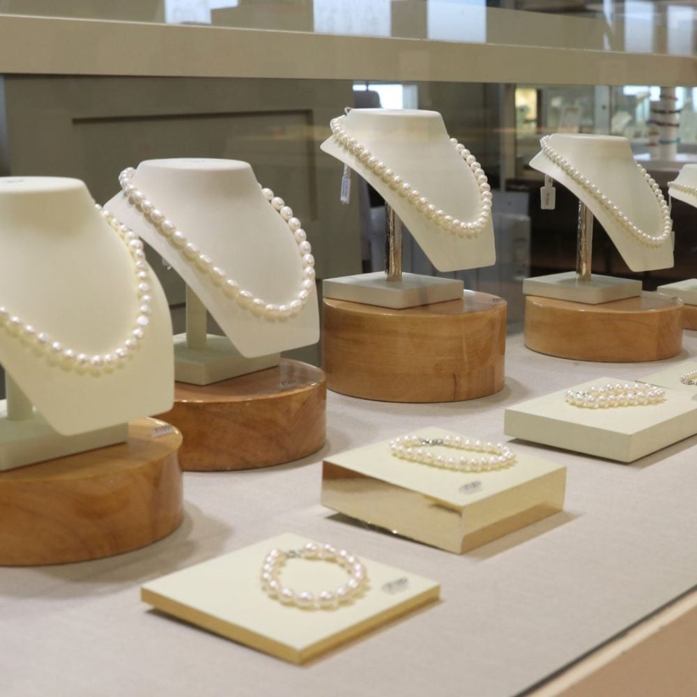 Isle of Wight Pearl Pearls pearl jewellery stands inside the cabinets at isle of wight pearl